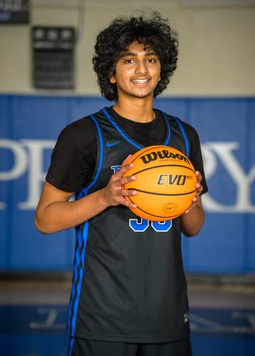Akshay at basketball media day, holding a ball