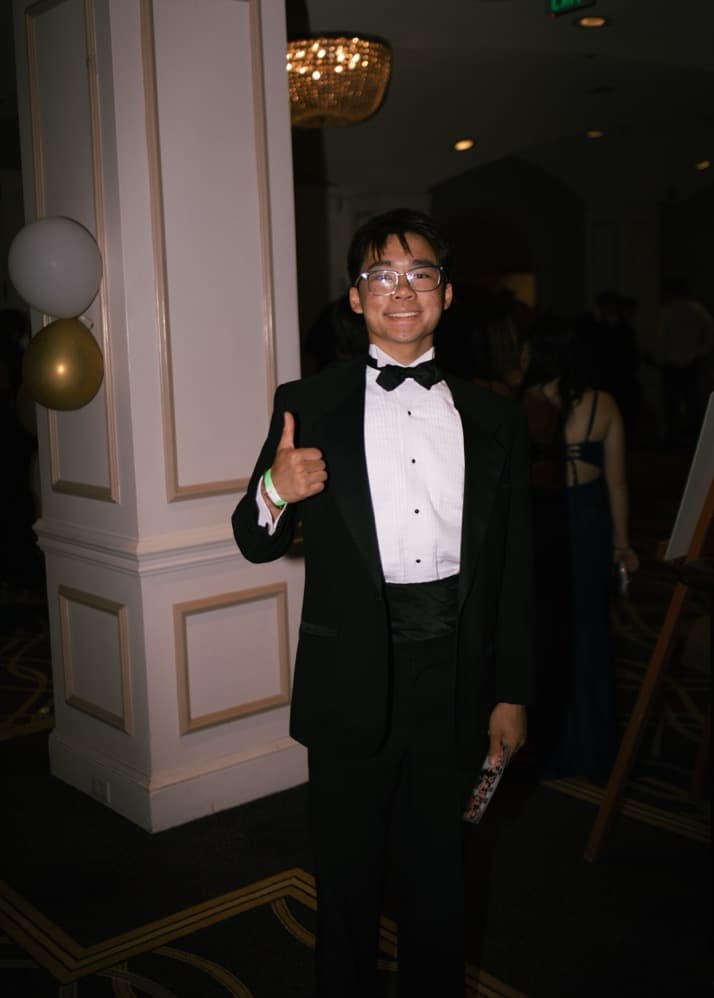 Trevor in a tuxedo at a formal event